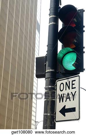 Low angle view of a directional sign on a traffic light, Chicago, Illinois, USA View Large Photo Image Stock Image - Low angle view of a directional sign on a traffic light, Chicago, Illinois, USA. Fotosearch