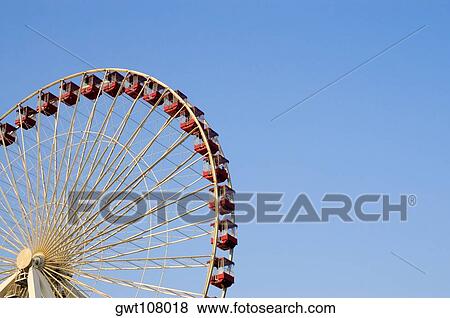Low angle view of a ferris wheel in an amusement park, Navy Pier Park, Chicago, Illinois, USA View Large Photo Image Stock Photo - Low angle view of a ferris wheel in an amusement park, Navy Pier Park, Chicago, Illinois, USA. Fotosearch