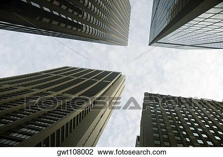 Low angle view of skyscrapers in a city, Chicago, Illinois, USA View Large Photo Image Stock Image - Low angle view of skyscrapers in a city, Chicago, Illinois, USA. Fotosearch
