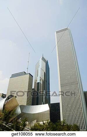 Stock Photography - Low angle view of skyscrapers in a city, Aon Center and Two Prudential Plaza, Chicago, Illinois, USA. Fotosearch