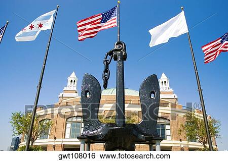 Low angle view of the flags in front of a building, Navy Pier, Chicago, Illinois, USA View Large Photo Image Stock Photograph - Low angle view of the flags in front of a building, Navy Pier, Chicago, Illinois, USA. Fotosearch