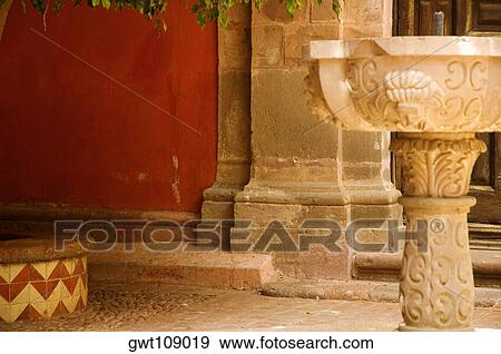 Stock Photo - Close-up of a birdbath, Mexico. Fotosearch