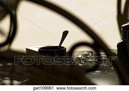 Close-up of a cup with an ashtray, Mexico View Large Photo Image Stock Image - Close-up of a cup with an ashtray, Mexico. Fotosearch