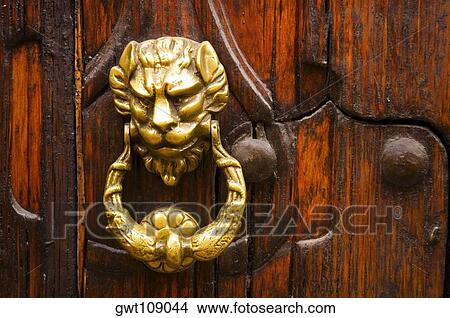 Picture - Close-up of a doorknocker. Fotosearch