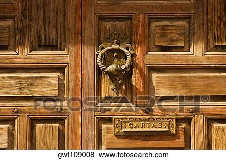 Close-up of a doorknocker View Large Photo Image Stock Photo - Close-up of a doorknocker. Fotosearch