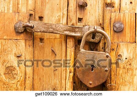 Close-up of a lock on a door View Large Photo Image Stock Photograph - Close-up of a lock on a door. Fotosearch