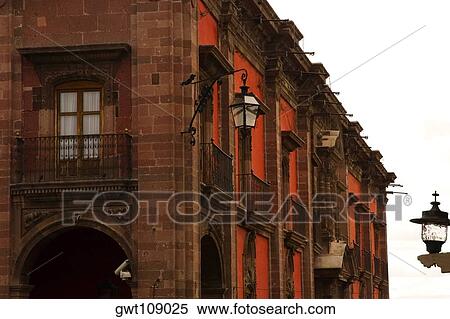 Stock Photography - Lantern hanging on a building, Mexico. Fotosearch