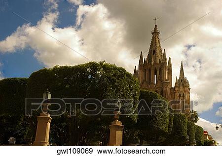 Low angle view of a cathedral, La Parroquia De San Miguel Arcangel Church, San Miguel De Allende, Guanajuato, Mexico View Large Photo Image Stock Photo - Low angle view of a cathedral, La Parroquia De San Miguel Arcangel Church, San Miguel De Allende, Guanajuato, Mexico. Fotosearch