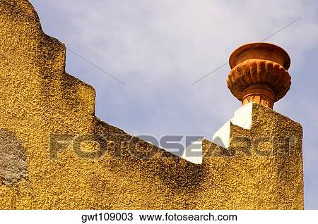 Low angle view of a decorative urn on top of a wall, Mexico View Large Photo Image Stock Image - Low angle view of a decorative urn on top of a wall, Mexico. Fotosearch