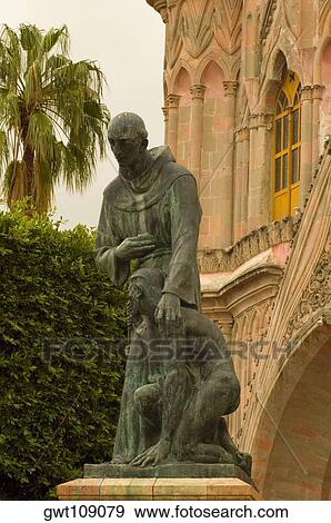 Low angle view of a statue in front of a cathedral, La Parroquia De San Miguel Arcangel Church, San Miguel De Allende, Guanajuato, Mexico View Large Photo Image Stock Photo - Low angle view of a statue in front of a cathedral, La Parroquia De San Miguel Arcangel Church, San Miguel De Allende, Guanajuato, Mexico. Fotosearch
