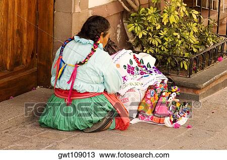 Rear view of a woman with puppets, Mexico View Large Photo Image Stock Image - Rear view of a woman with puppets, Mexico. Fotosearch
