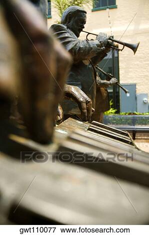 Close-up of statues of three musicians playing musical instruments, New Orleans, Louisiana, USA View Large Photo Image Stock Photo - Close-up of statues of three musicians playing musical instruments, New Orleans, Louisiana, USA. Fotosearch
