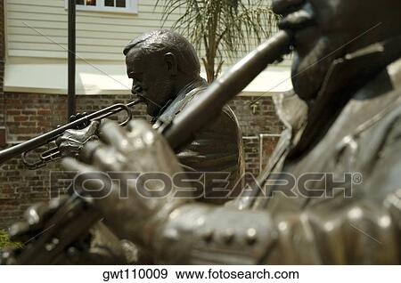 Close-up of statues of two musicians playing musical instruments, New Orleans, Louisiana, USA View Large Photo Image Stock Photo - Close-up of statues of two musicians playing musical instruments, New Orleans, Louisiana, USA. Fotosearch