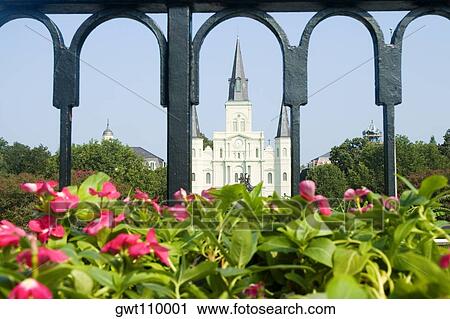 Facade of a cathedral seen through a gate, St. Louis Cathedral, Jackson Square, New Orleans, Louisiana, USA View Large Photo Image Stock Image - Facade of a cathedral seen through a gate, St. Louis Cathedral, Jackson Square, New Orleans, Louisiana, USA. Fotosearch