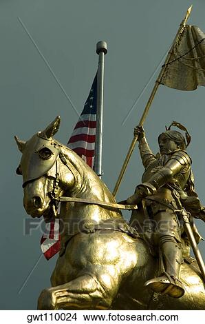 Low angle view of a statue of St. Joan Of Arc, New Orleans, Louisiana, USA View Large Photo Image Picture - Low angle view of a statue of St. Joan Of Arc, New Orleans, Louisiana, USA. Fotosearch