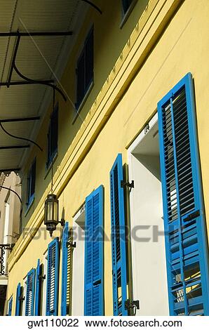 Stock Image - Low angle view of open doors of a building, New Orleans, Louisiana, USA. Fotosearch