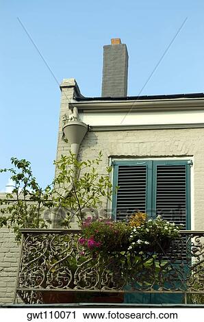 Low angle view of plants on the balcony of a building, New Orleans, Louisiana, USA View Large Photo Image Stock Image - Low angle view of plants on the balcony of a building, New Orleans, Louisiana, USA. Fotosearch