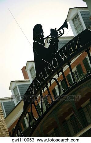 Low angle view of the statue of a man playing the trumpet, New Orleans, Louisiana, USA View Large Photo Image Stock Image - Low angle view of the statue of a man playing the trumpet, New Orleans, Louisiana, USA. Fotosearch