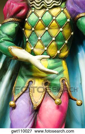 Mid section view of the painted statue of a joker, New Orleans, Louisiana, USA View Large Photo Image Stock Photo - Mid section view of the painted statue of a joker, New Orleans, Louisiana, USA. Fotosearch