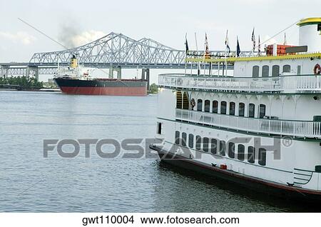Paddle steamer in a river, Mississippi River, New Orleans, Louisiana, USA View Large Photo Image Picture - Paddle steamer in a river, Mississippi River, New Orleans, Louisiana, USA. Fotosearch