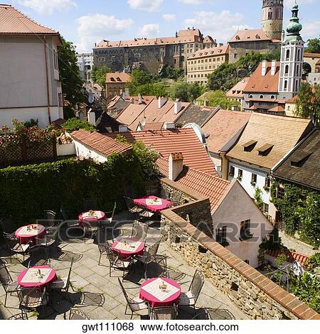 High angle view of table and chairs on the terrace of a building, Czech Republic View Large Photo Image Stock Photo - High angle view of table and chairs on the terrace of a building, Czech Republic. Fotosearch
