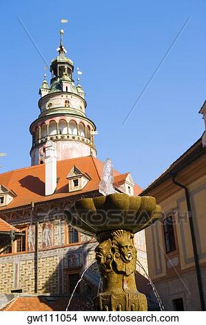 Low angle view of fountain in front of a tower, Czech Republic View Large Photo Image Picture - Low angle view of fountain in front of a tower, Czech Republic. Fotosearch