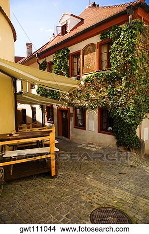 Picture - Rear view of a person sitting on a bench, Czech Republic. Fotosearch
