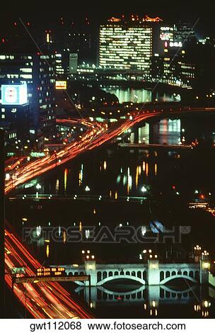 Aerial view of a city at night, Osaka Financial Center, Osaka, Japan View Large Photo Image Stock Photo - Aerial view of a city at night, Osaka Financial Center, Osaka, Japan. Fotosearch