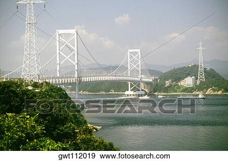 Stock Photo - Bridge across the river, Naruto Bridge, Shikoku, Japan. Fotosearch