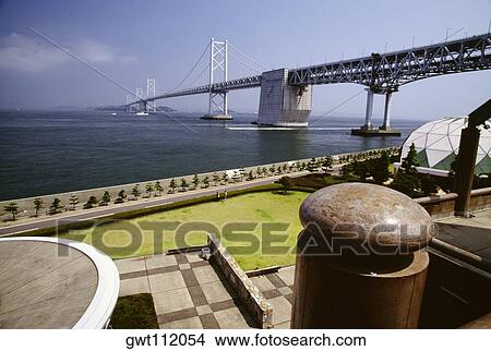 High angle view of a lawn near a bridge, Seto Ohashi Bridge, Shikoku, Japan View Large Photo Image Picture - High angle view of a lawn near a bridge, Seto Ohashi Bridge, Shikoku, Japan. Fotosearch