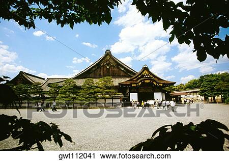 Large group of people walking in front of a castle, Nijo Castle, Kyoto, Japan View Large Photo Image Stock Image - Large group of people walking in front of a castle, Nijo Castle, Kyoto, Japan. Fotosearch
