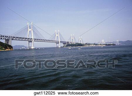 Low angle view of a bridge, Seto Ohashi Bridge, Shikoku, Japan View Large Photo Image Stock Photography - Low angle view of a bridge, Seto Ohashi Bridge, Shikoku, Japan. Fotosearch