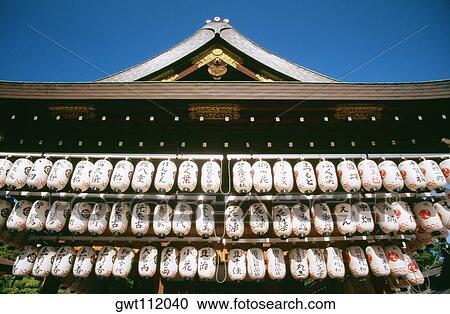 Low angle view of lanterns hanging from the roof of a temple, Kiyomizu Temple, Kyoto, Japan View Large Photo Image Stock Image - Low angle view of lanterns hanging from the roof of a temple, Kiyomizu Temple, Kyoto, Japan. Fotosearch