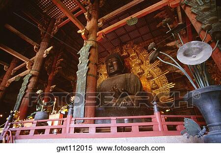 Low angle view of the statue of Buddha, Todaji Temple, Nara, Japan View Large Photo Image Stock Photography - Low angle view of the statue of Buddha, Todaji Temple, Nara, Japan. Fotosearch