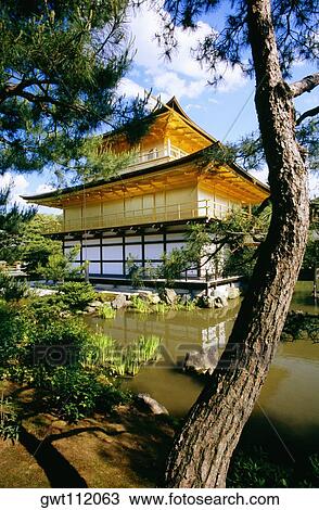 Stock Image - Pond in front of a temple, Golden Pavilion, Kyoto, Japan. Fotosearch