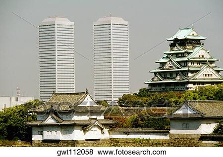 Skyscrapers and a castle in the city, Osaka Castle, Osaka, Japan View Large Photo Image Stock Photo - Skyscrapers and a castle in the city, Osaka Castle, Osaka, Japan. Fotosearch
