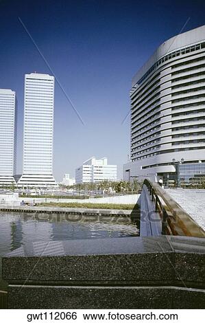 Skyscrapers in a city, Twin Towers and New Otani Hotel, Osaka, Japan View Large Photo Image Stock Photograph - Skyscrapers in a city, Twin Towers and New Otani Hotel, Osaka, Japan. Fotosearch