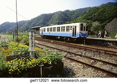 Train on a railroad track, Kochi, Shikoku, Japan View Large Photo Image Stock Image - Train on a railroad track, Kochi, Shikoku, Japan. Fotosearch