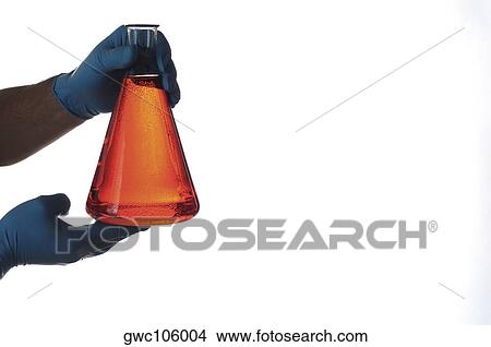 Close-up of a beaker in a person's hand View Large Photo Image Picture - Close-up of a beaker in a person's hand. Fotosearch