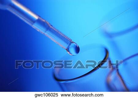Close-up of a dropper over a test tube View Large Photo Image Stock Photography - Close-up of a dropper over a test tube. Fotosearch