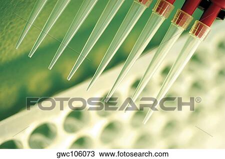 Close-up of a jar of liquid in a person's hand View Large Photo Image Stock Image - Close-up of a jar of liquid in a person's hand. Fotosearch