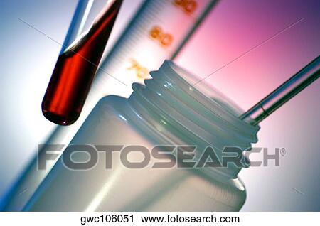 Close-up of a pipette with a test tube and a bottle View Large Photo Image Stock Image - Close-up of a pipette with a test tube and a bottle. Fotosearch