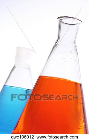 Close-up of two beakers containing chemicals View Large Photo Image Stock Image - Close-up of two beakers containing chemicals. Fotosearch