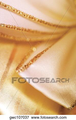 Close-up of a bow on a Christmas present View Large Photo Image Stock Photo - Close-up of a bow on a Christmas present. Fotosearch