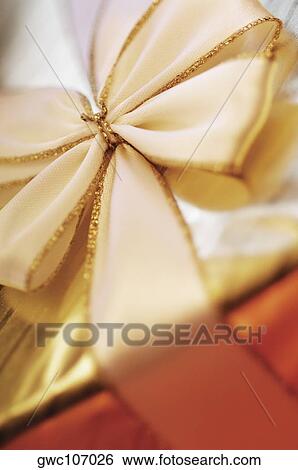 Close-up of a Christmas present View Large Photo Image Stock Photograph - Close-up of a Christmas present. Fotosearch