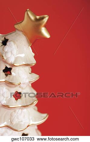 Close-up of a Christmas tree figurine View Large Photo Image Stock Image - Close-up of a Christmas tree figurine. Fotosearch