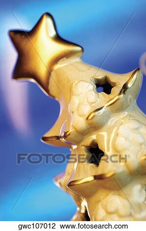 Stock Image - Close-up of a Christmas tree shaped figurine. Fotosearch