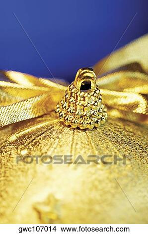 Close-up of a golden Christmas ball View Large Photo Image Picture - Close-up of a golden Christmas ball. Fotosearch