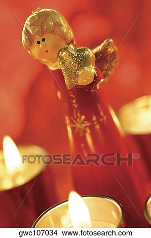 Close-up of an angel figurine View Large Photo Image Picture - Close-up of an angel figurine. Fotosearch