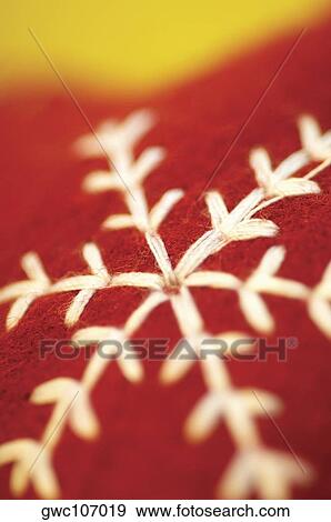 Stock Photo - Close-up of embroidery on a cushion. Fotosearch
